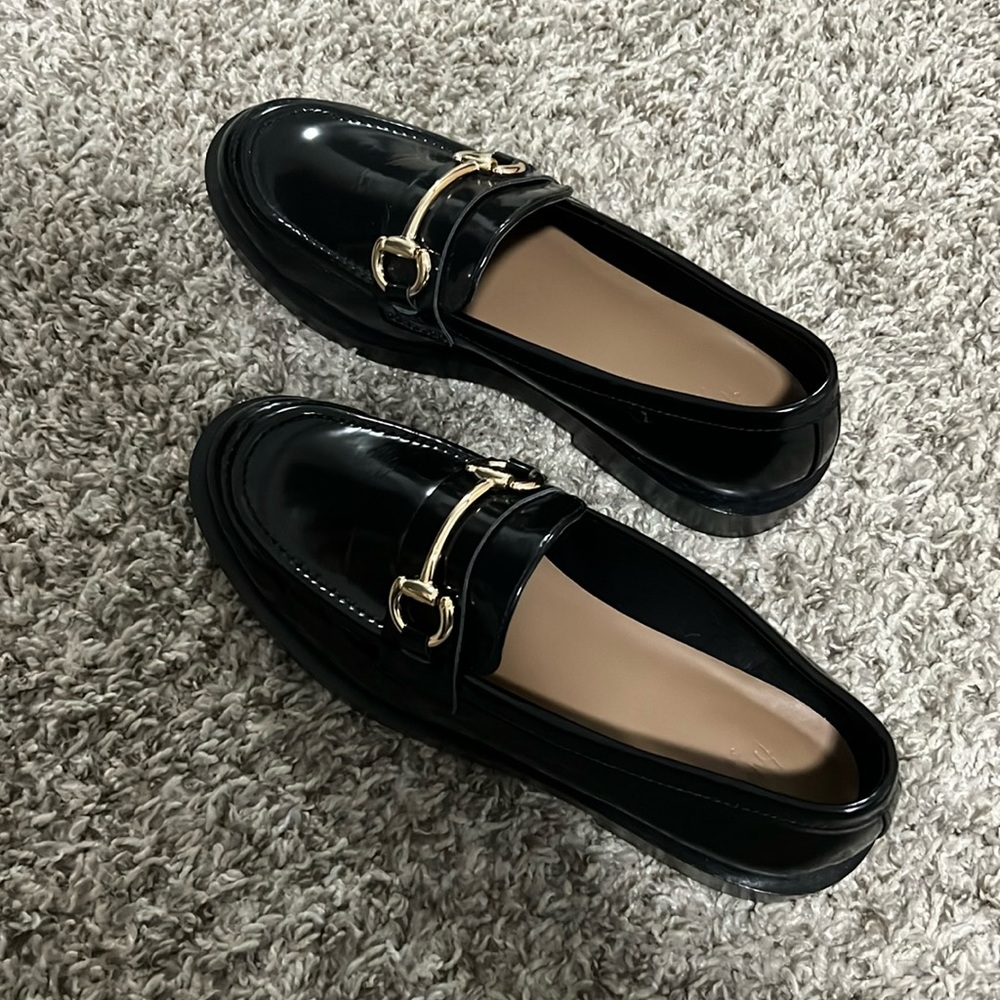 Black Loafers with Gold Accents